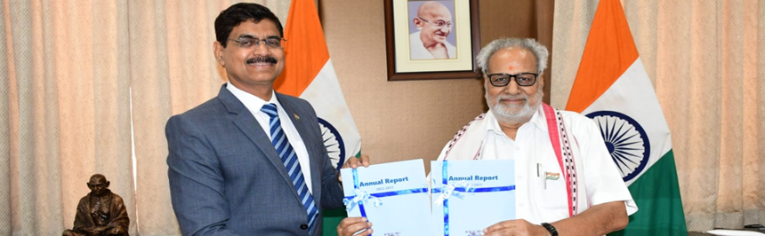 Chairman presenting the Annual Report 2022-23 to Hon’ble Governor, Odisha, Prof. Ganeshi Lal at Rajbhawan on 29th May 2023