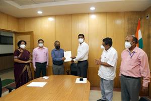 Appreciation of Officers by the Commission : Shri Ashok Kumar Das, Secretary, OPSC receiving the appreciation letter from Hon’ble Chairman, OPSC