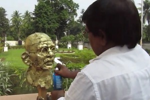 Deft Touch of a Sculptor Carving Portrait of Father of the Nation by Mr. Rabi Narayan Rath on 75th Independence Day Celebration at Odisha Public Service Commission