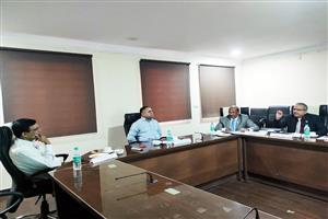 Hon'ble Member Prof. C.S.K. Mishra &amp; Hon'ble Member Er. G.C. Sahu in a discussion with Hon'ble Chairman &amp; Secretary of Gujarat Public Service Commission